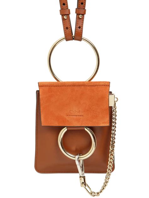 The <b>Faye</b> <b>mini</b> chain bag is a compact yet elegant accessory that echoes the line's clean, contemporary aesthetic. . Chloe faye mini